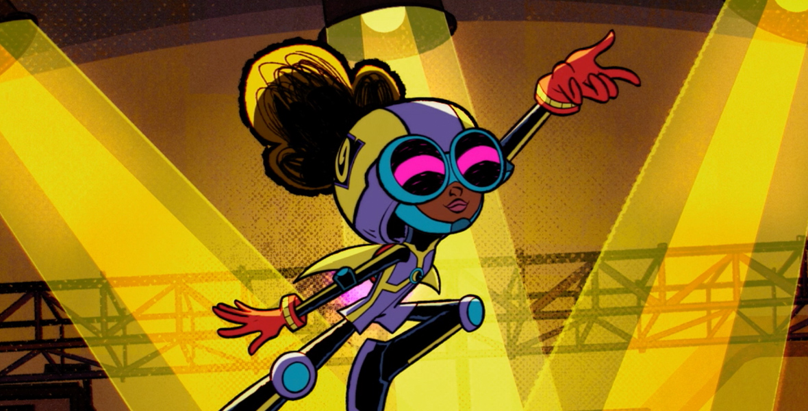 In a trailer screen shot for Season 2 of Marvel’s Moon Girl and Devil Dinosaur, Lunella Lafayette, aka Moon Girl, wears blue-rimmed goggles with pink bands of light intersecting in the middle of the lenses, a purple and yellow helmet, and similarly colored outfit and boots. She is leaping in mid-air with her left hand extended and right hand down by her side. Her hands are covered in red gloves with yellow trim.